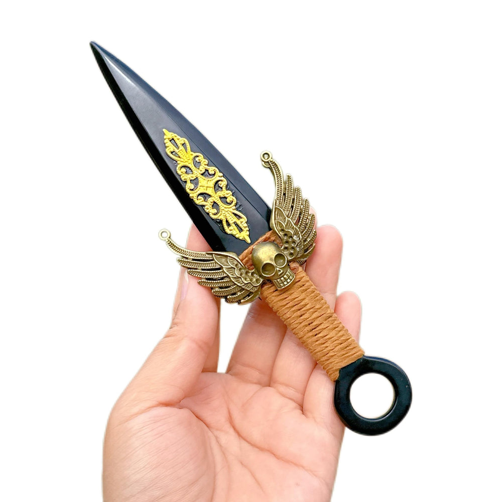 Crystland obsidian skull knife artwork adds dramatic focal point.