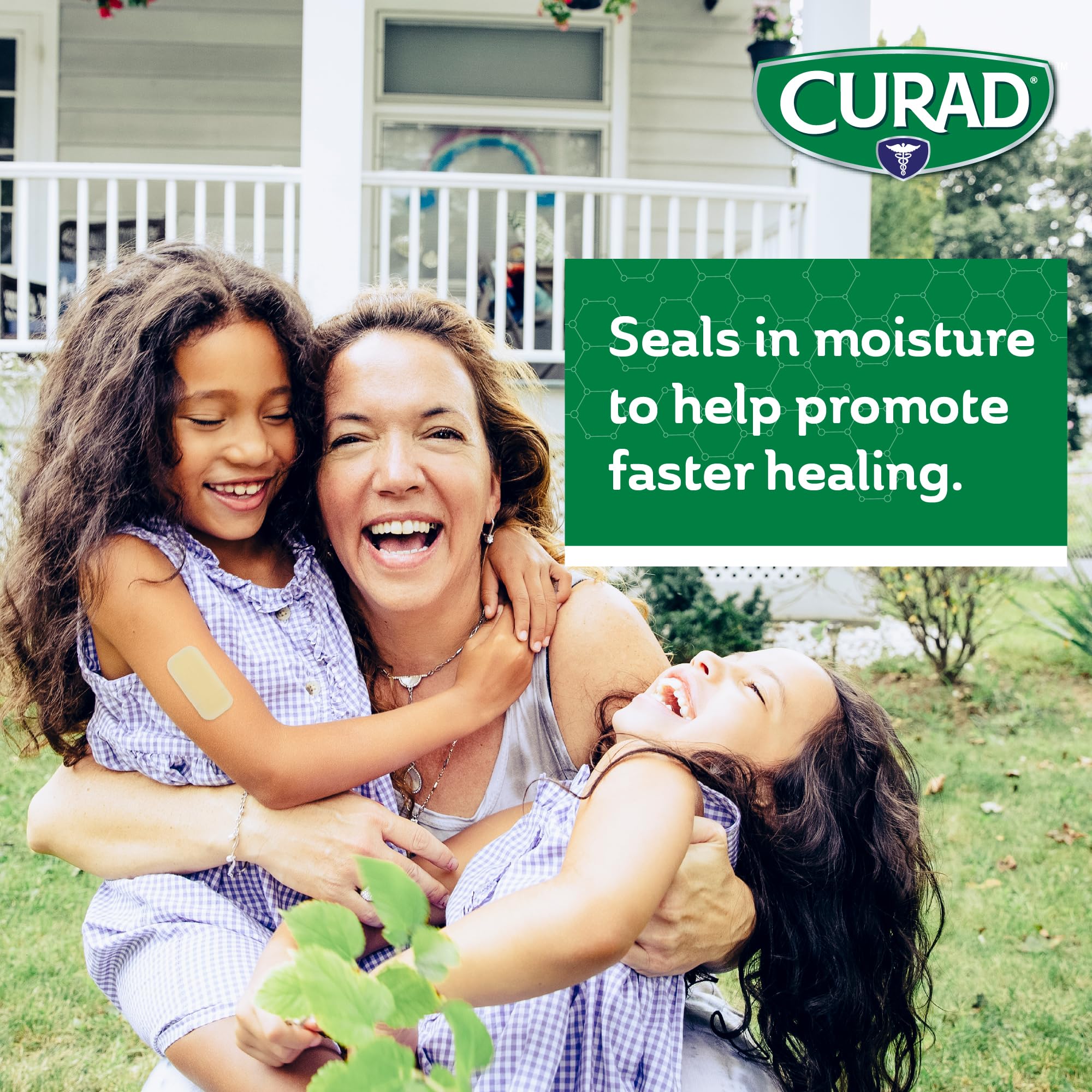 CURAD Naturals Aloe Vera bandage close-up highlighting soothing Aloe.
