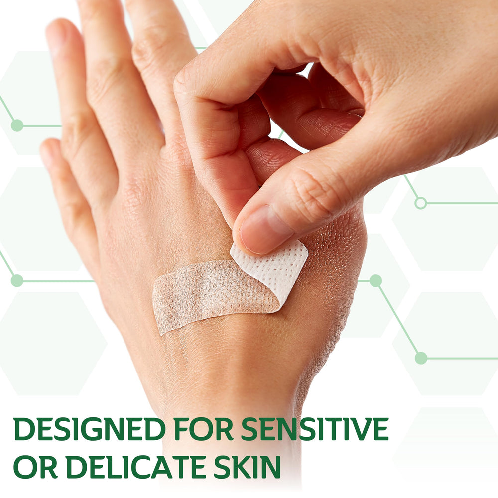 CURAD Truly Ouchless bandage repositioned over a wound for a new seal.