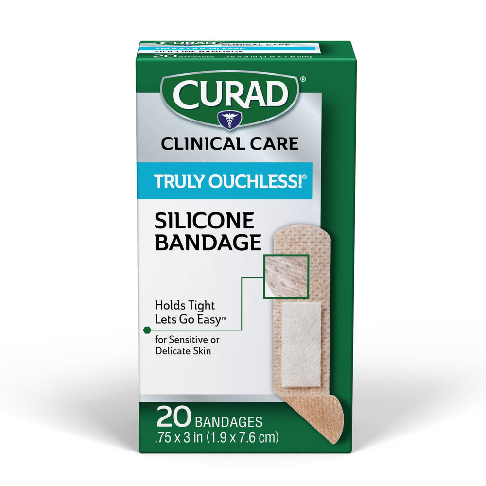 CURAD Truly Ouchless bandages close-up with gentle silicone adhesive on skin.