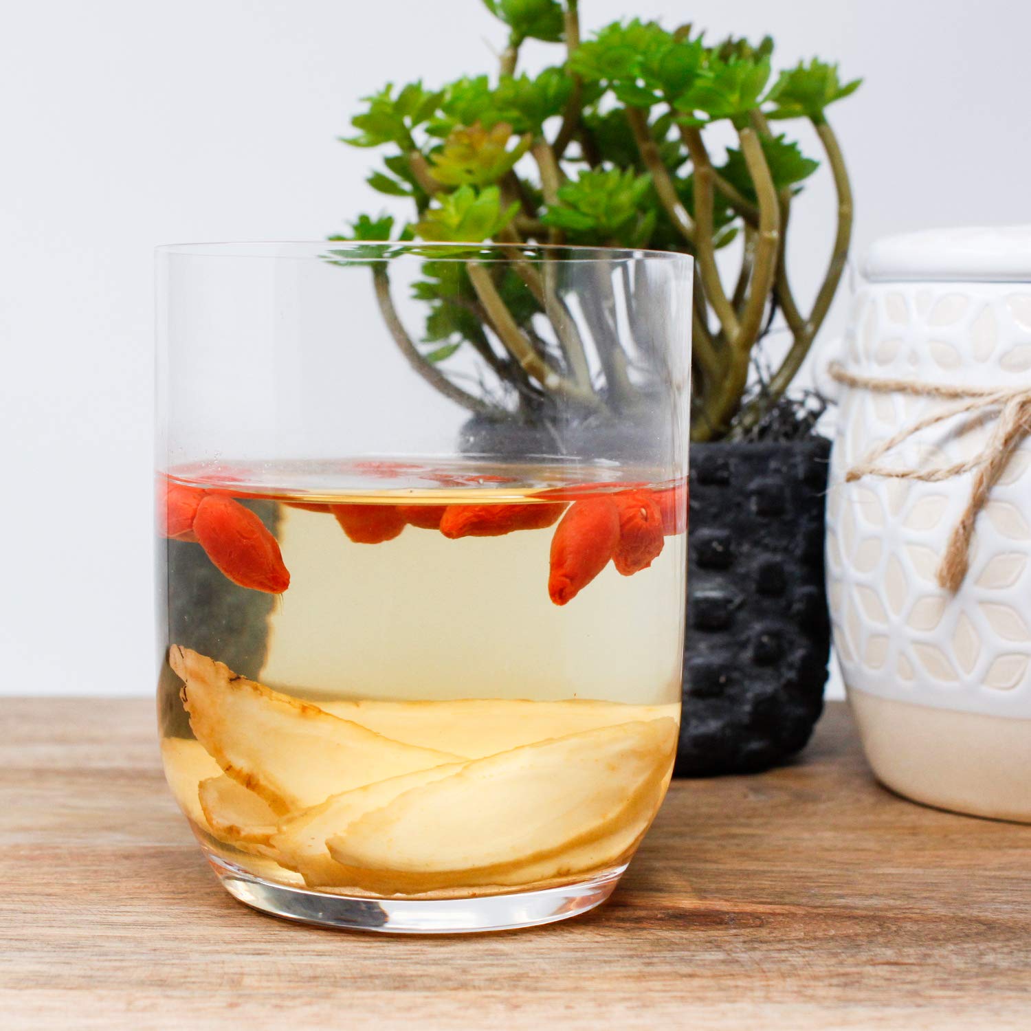 DABC OAK LAND ginseng slices in tea cup ready for sipping.