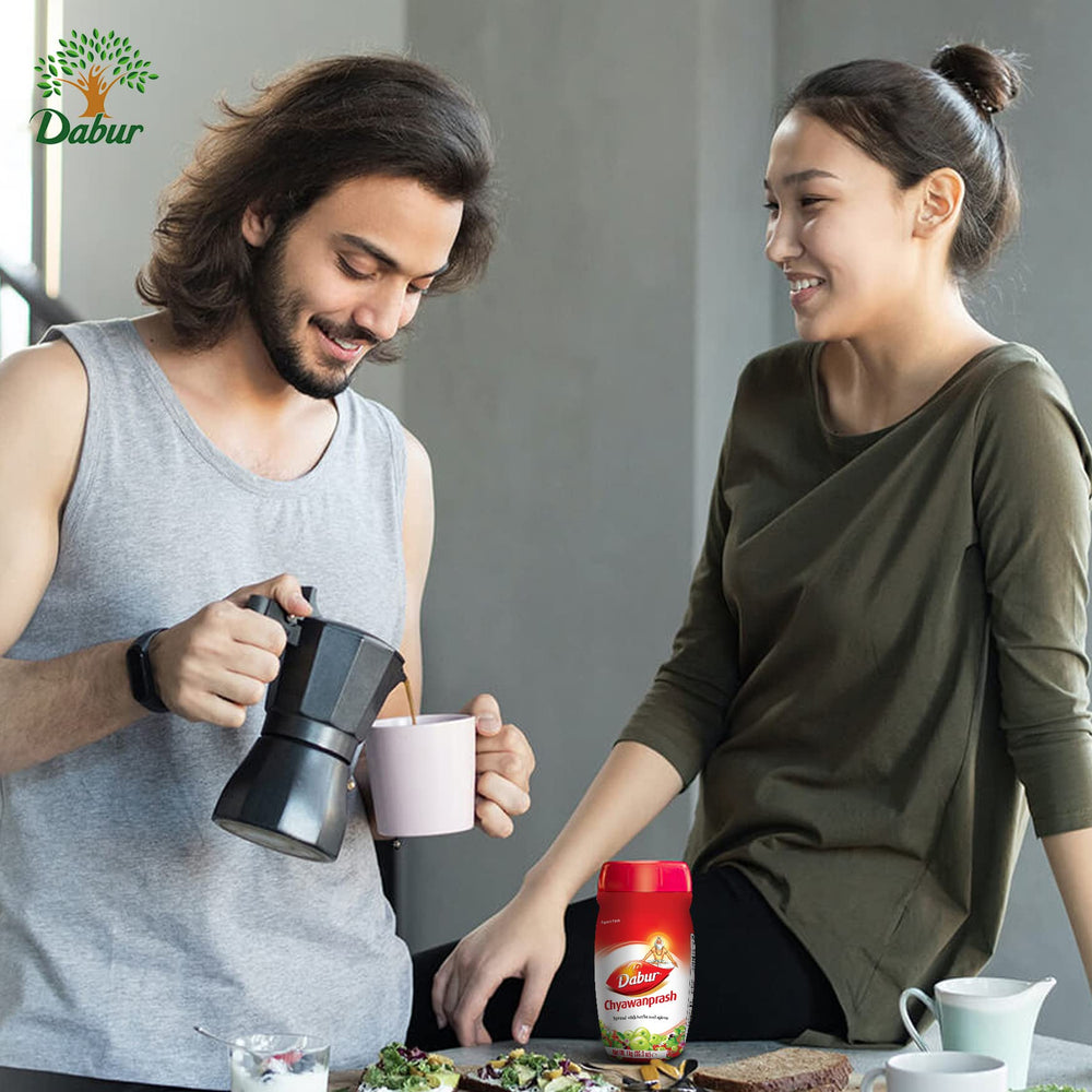Amla, Giloy and Pippali notes in Dabur Chyawanprash spread.