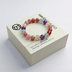 Dare to Mystic wrist display features multi-stone bracelet on skin