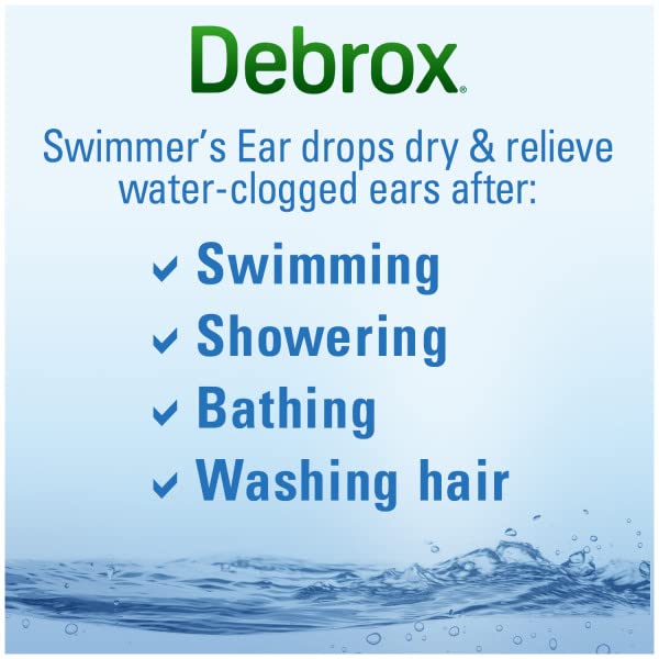 Debrox drops being applied after shower to help ears dry.