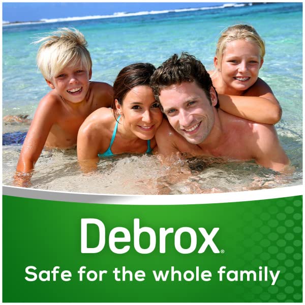 Debrox bottle in hand after pool for drying.