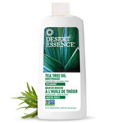 Tea Tree Mouthwash label close-up highlighting plant-based ingredients and aroma.