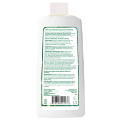 Desert Essence Tea Tree Mouthwash pour shot with spearmint aroma.
