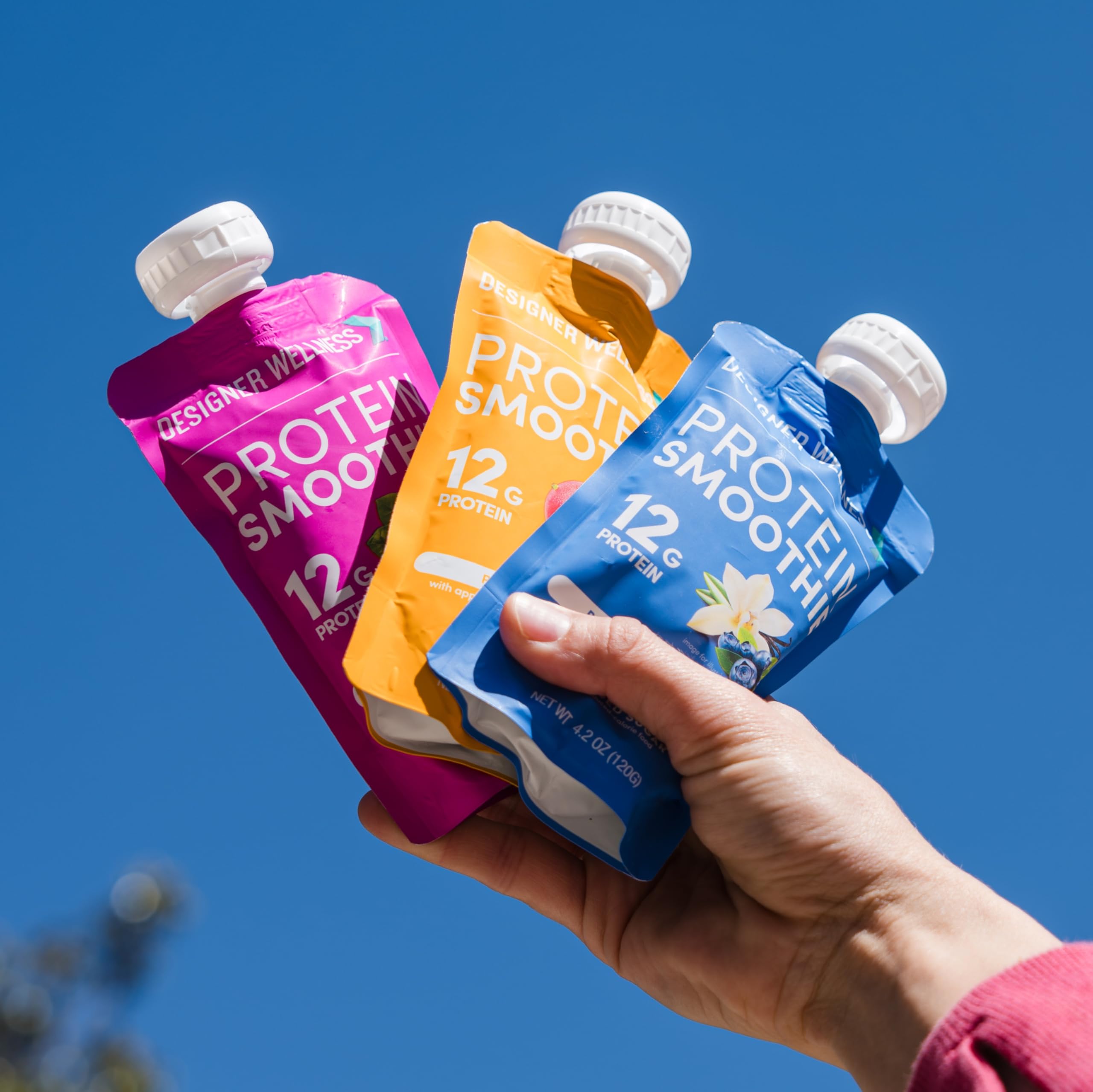 Designer Wellness Protein Smoothie Peach Mango nutrition panel highlights 12g protein.
