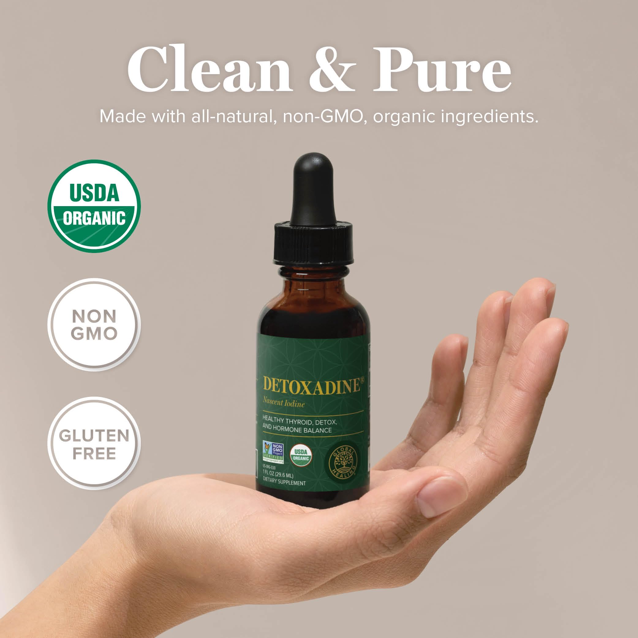 Detoxadine bottle label close-up highlighting vegan and non-GMO status.