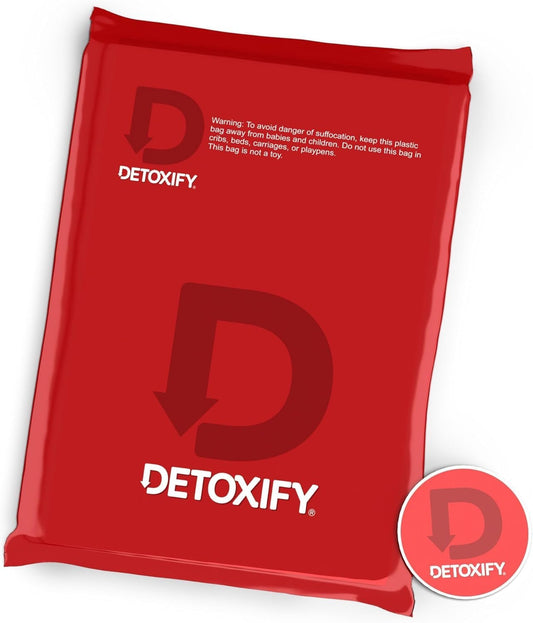 Detoxify Mega Clean NT Tropical bottle close-up showing label for daily wellness