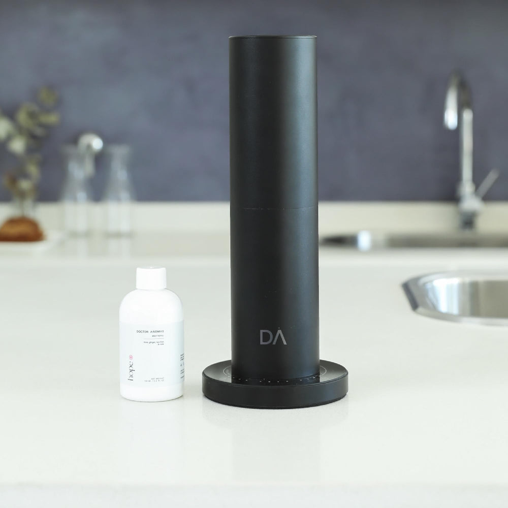 Hope refill packaging beside diffuser, signaling long-lasting fragrance
