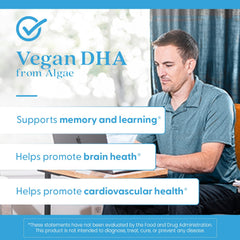 Hand holding bottle illustrates convenient daily supplementation for brain and heart support.