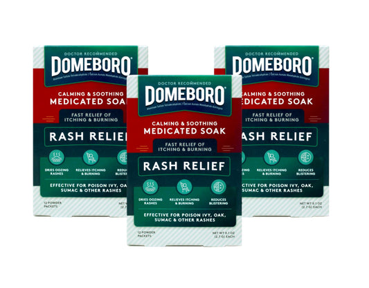 Domeboro Soothing Soak Powder Packets in box for convenient rash relief