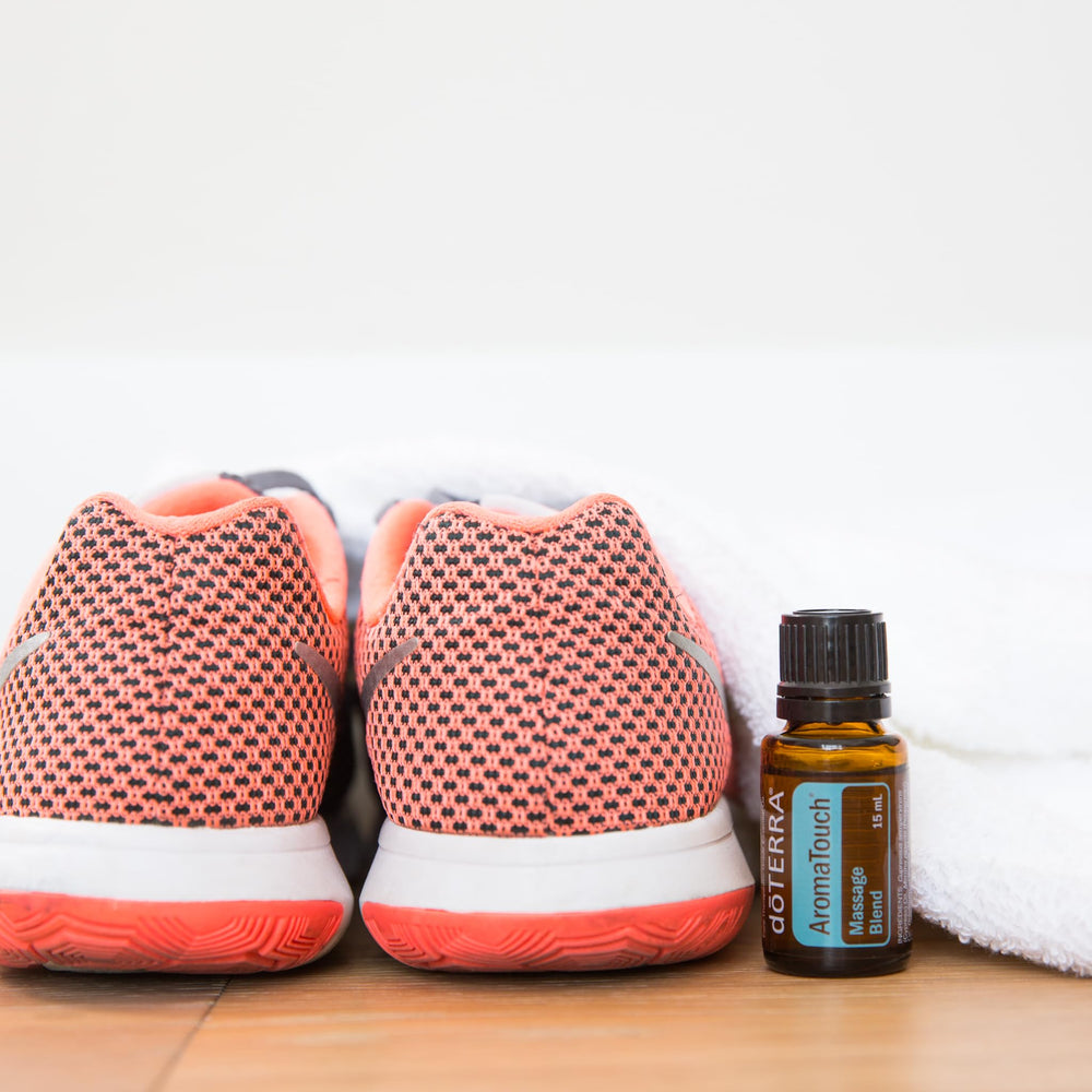 doTERRA AromaTouch label close-up shows ingredient notes for at-home use