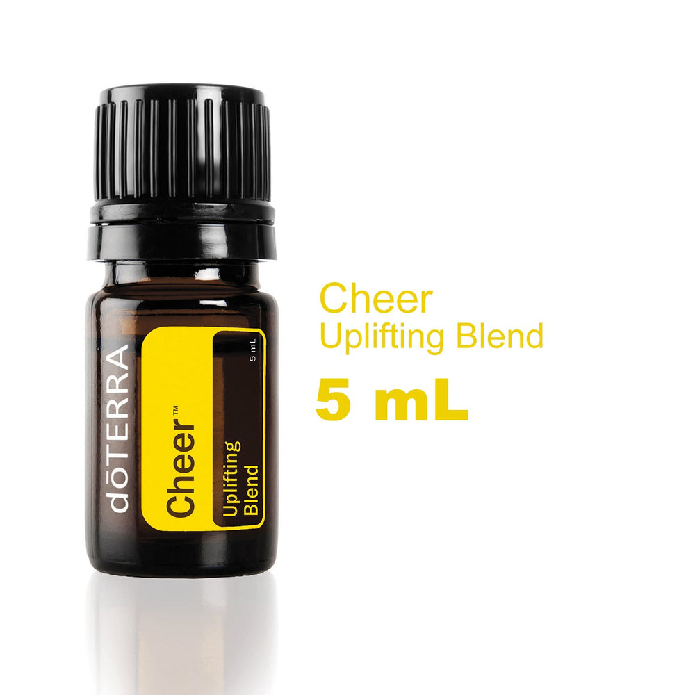 Close-up of doTERRA Cheer label highlighting uplifting citrus and spice notes.