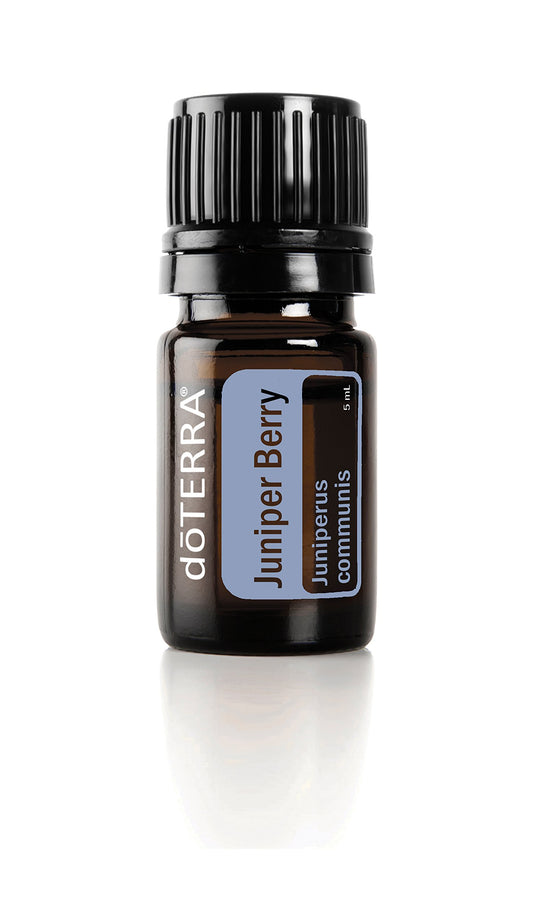 doTERRA Juniper Berry essential oil bottle showing cleansing, skin toning, and calming uses