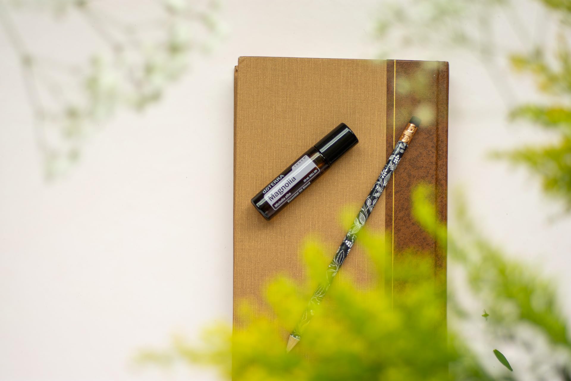 doTERRA Magnolia Touch bottle provides moisturizing oil for daily skin care