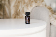 PastTense oil label closeup highlighting soothing aroma notes.