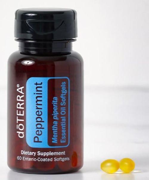 doTERRA Peppermint Softgels packaging on desk for daily digestive support.
