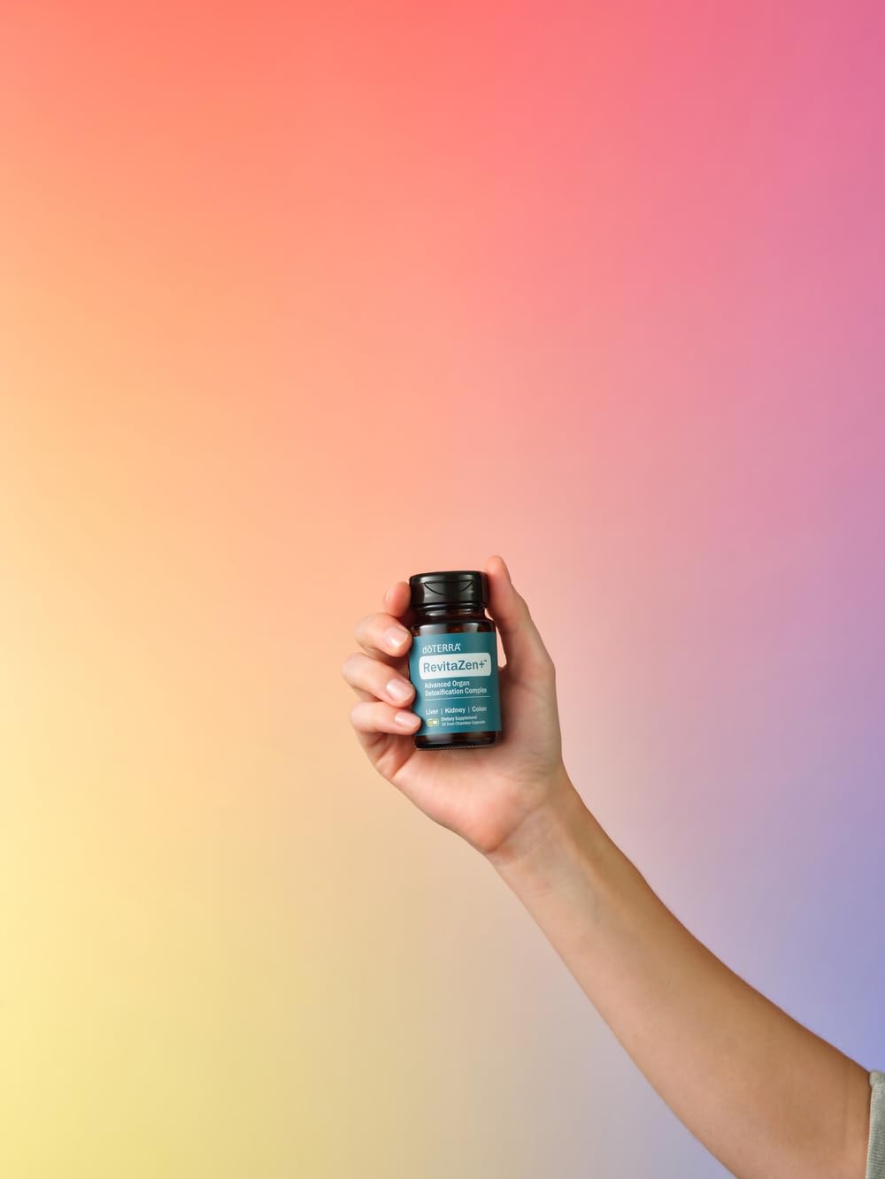 doTERRA RevitaZen+ daily use with glass of water in lifestyle shot