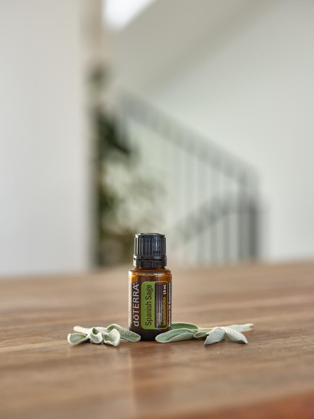 doTERRA Spanish Sage Oil cap closeup; sealed for purity, ready to diffuse uplifting atmosphere.