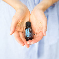 doTERRA Ylang Ylang perfume on wrist with floral scent