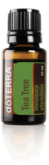 doTERRA Melaleuca oil bottle showing purifying properties for skin and surfaces.
