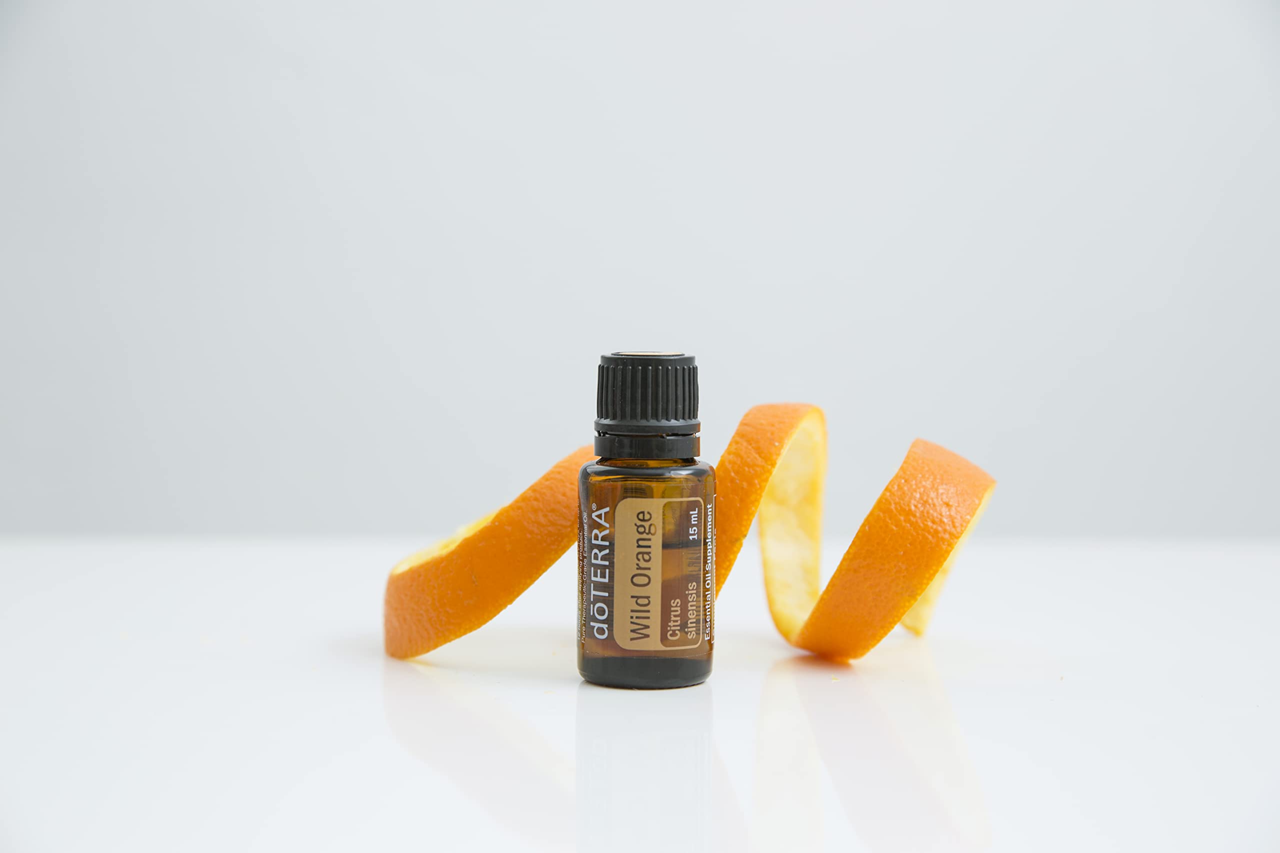 doTERRA Wild Orange bottle in kitchen cleaning spray idea.
