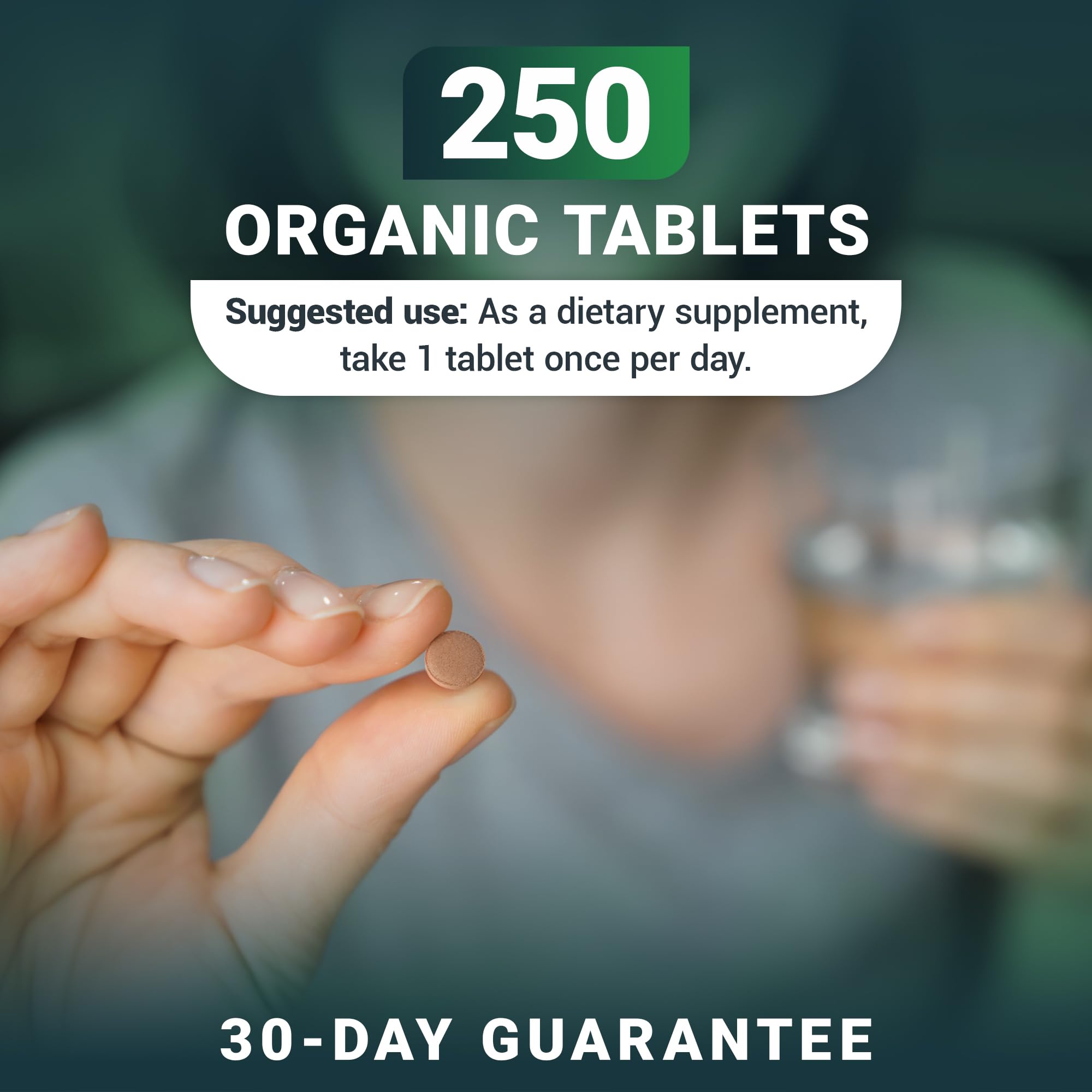 Dr. Berg's Greens bottle with opened cap—easy-to-swallow tablets ready to take.