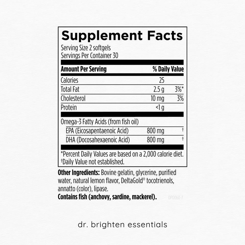 Dr. Brighten Omega Plus two softgels for daily use beside glass of water