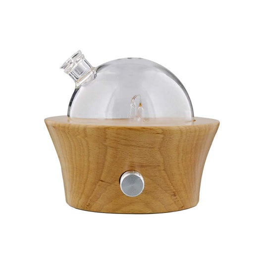 Dr. Mercola dry aroma diffuser with beechwood base and glass reservoir.