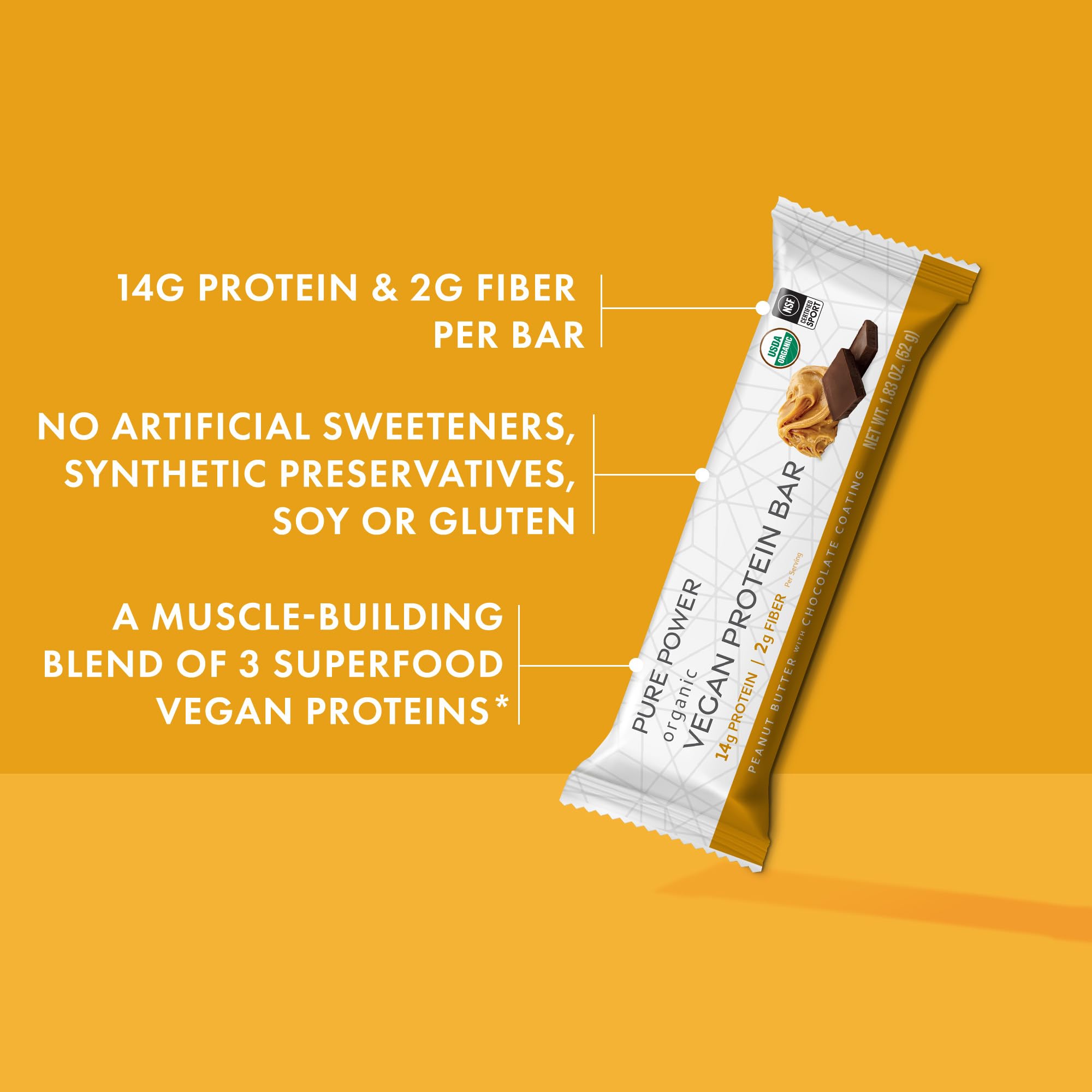 Dr. Mercola Pure Power bar bite close-up demonstrates chewy texture and cacao richness.
