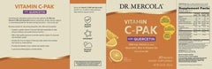 Dr. Mercola Vitamin C-PAK dissolving in water with bright orange fizz and nutrients