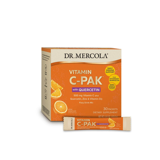 Dr. Mercola Vitamin C-PAK orange effervescent packets dissolving in water for daily immunity