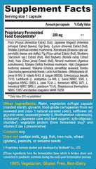 Close up of capsules showing coated probiotic delivery for stomach acid resistance