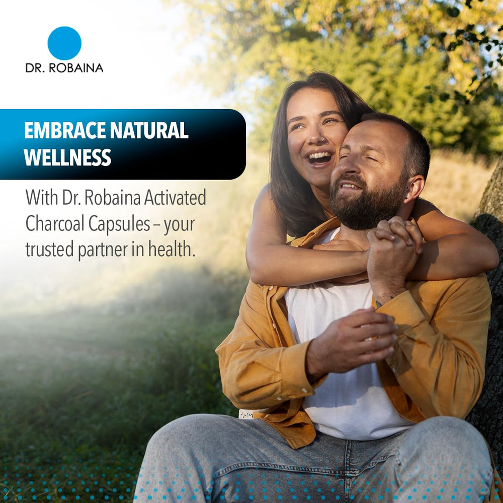 Dr. Robaina capsules in hand demonstrating easy digestive support.