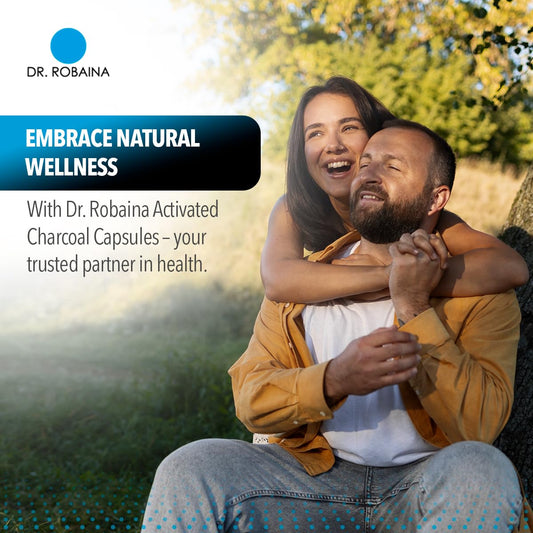Dr. Robaina capsules in hand demonstrating easy digestive support.