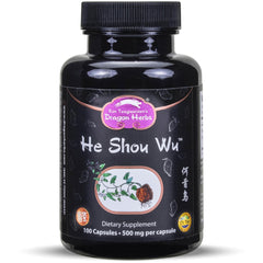 Dragon Herbs He Shou Wu capsules on a desk for daily energy support