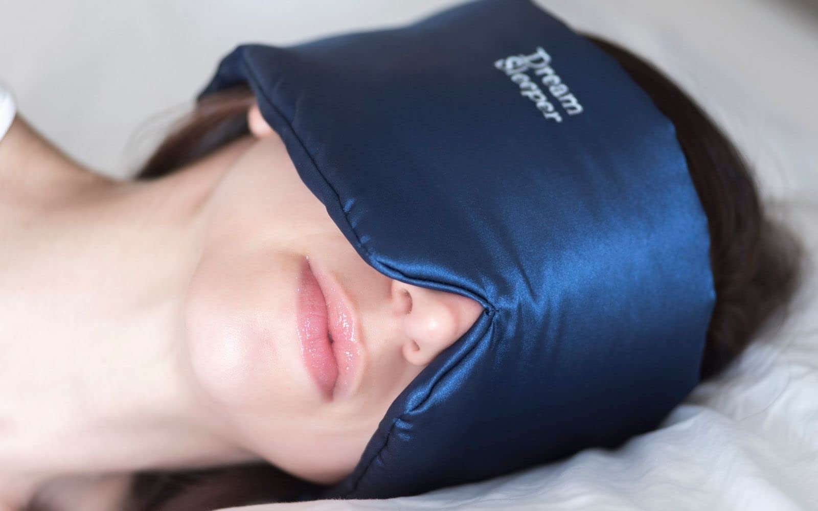 Dream Sleeper hypoallergenic sleep mask blocks light for restful nights.