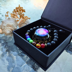 DREMINOVA orgonite pendant close-up in black obsidian highlights craftsmanship for mindful wear.