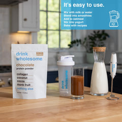 Glass of prepared shake with Drink Wholesome powder, low FODMAP friendly option