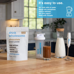 Drink Wholesome shake being mixed, showing creamy texture from egg-white protein