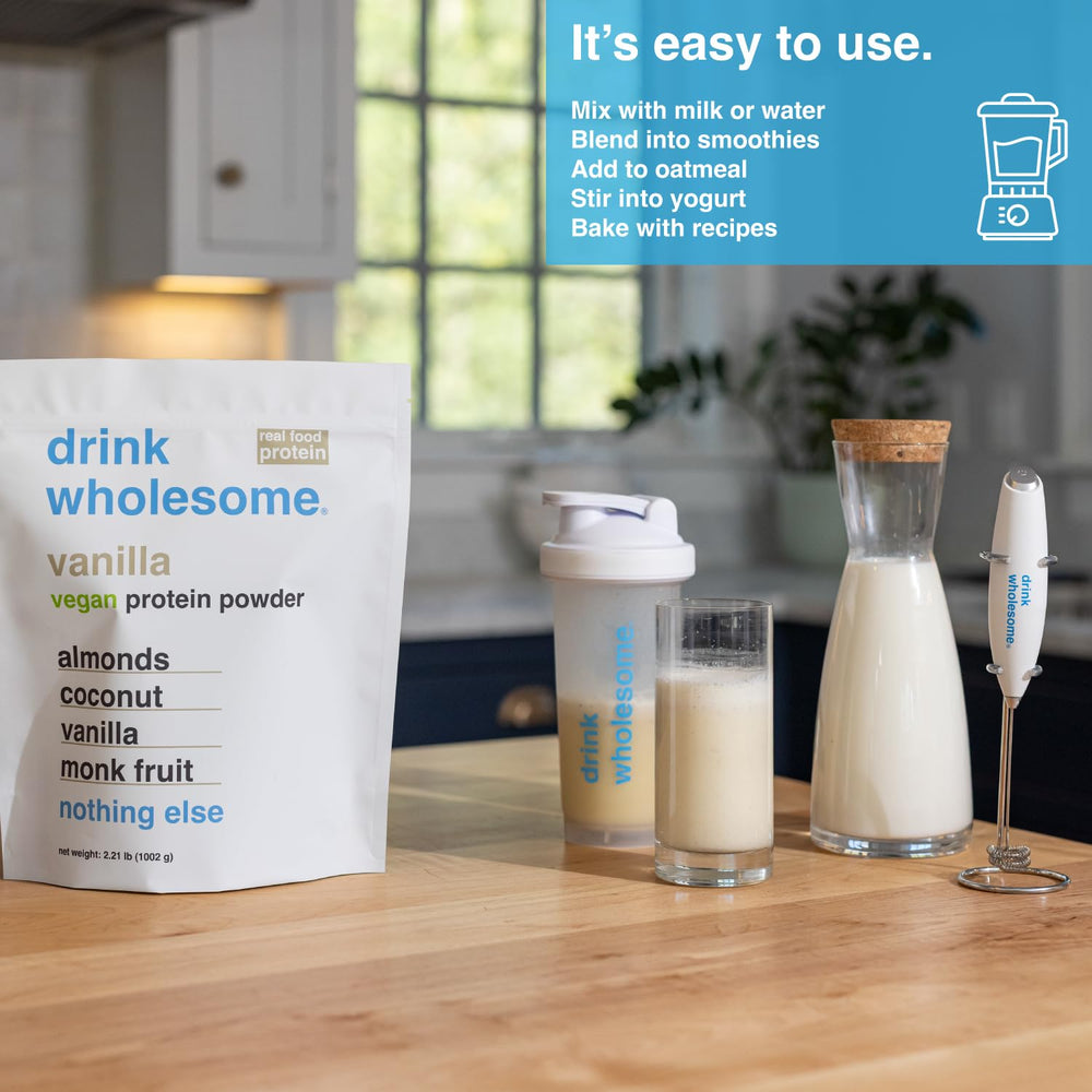 Scoop of Drink Wholesome Vanilla Almond Protein suggests gluten-free, low-sodium options.