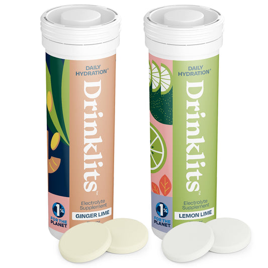Drinklits Ginger-Lime tablets dissolving in water for refreshing hydration on the go.