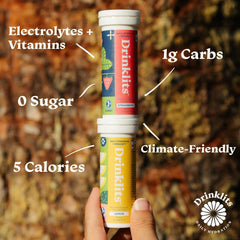 Drinklits strawberry immune tablets tube side view showing compact travel-friendly packaging.