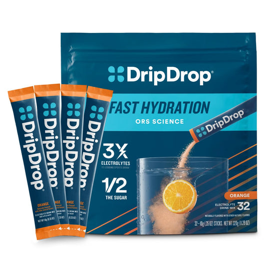 DripDrop orange electrolyte packet closeup, convenient on-the-go hydration for workouts.