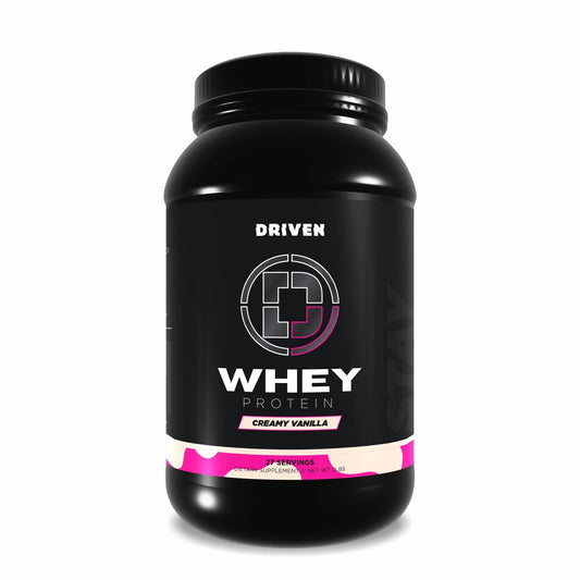 Driven WHEY vanilla tub on counter, grass-fed protein for post-workout recovery
