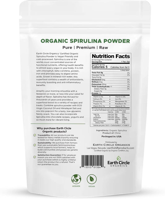 Earth Circle Organics Spirulina powder scoop pouring into a smoothie.