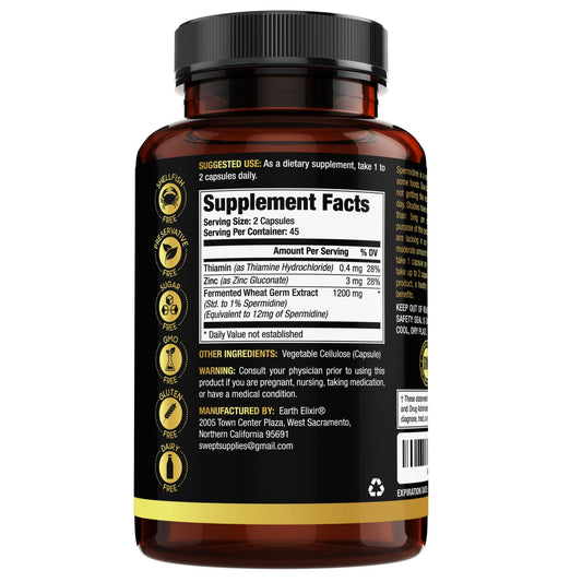 Close-up of Earth Elixir Spermidine capsules highlighting vegan, gluten-free formula.