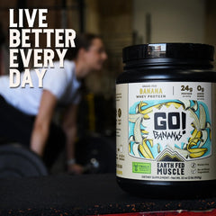 Earth Fed Muscle Go! Bananas packaging beside gym gear for athletes.